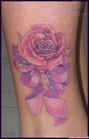 Beautiful cancer ribbon tattoo.i like it but with a pentagram instead of a cross. Rose And Ribbon Tattoo