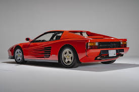 In the mid of the 1988 model year, the suspension was redesigned and the wheels were changed again from the single bolt knockoff setup to the standard ferrari five bolt pattern. 1990 Ferrari Testarossa Bingo æ ªå¼ä¼ç¤¾bh Auction