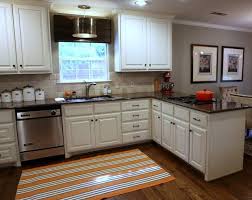 Like with any cabinets, the styles will have plenty of variety to offer. Favorite Dark Floors Cream Cabinets Gray Walls Granite Is Too Dark For My Taste Kitchen Layout Kitchen Redo Home Kitchens