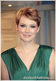 Add bangs that brush across your eyebrows. Curly Pixie Cut Round Face