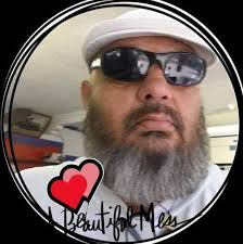 Macho Man Randy Savage painting a masterpiece of madness.