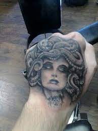 Pin By Alaina Smith On My Style Medusa Tattoo Tattoos Hand Tattoos