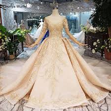 With that in mind, here is our pick of the best dresses and trouser suits for under £1,000 to see you through the bridal season. Ls11555g Golden Wedding Dresses Gown With Wedding Veil O Neck Long Sleeve Flowers Bridal Dress With Train ÙØ³Ø§ØªÙŠÙ† Ø·ÙˆÙŠÙ„Ù‡ Wedding Dresses Aliexpress