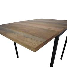 It seats two when its drop leaf panels are down and four when they're fully extended. 58 Off West Elm West Elm Box Frame Drop Leaf Expandable Table Tables