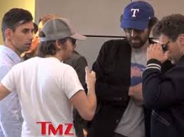 Daft punk are rarely seen without their robot helmets, but thomas bangalter was recently photographed sans costume (or shirt) on the beach; Daft Punk Unmasked Grammy Winners Spotted Without Robotic Helmets At Lax Airport The Independent The Independent