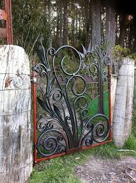 Much like the front door to your house, the gate to your backyard should also be warm and welcoming so guests feel comfortable coming in. Gorgeous Iron And Wooden Garden Gate Decoration Ideas Home Garden Inspiring Interior Outdoor And Diy Ideas Farm Gate Garden Gates Welding Art