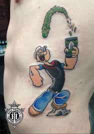 Popeye On The Ribs Tattooed In The Studio By Nathan Popeye Tattoo Rib Tattoo Geek Tattoo