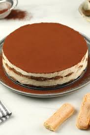 This tiramisu cake is made of 5 ingredient genoise cake layers brushed with espresso and filled with irresistibly creamy coffee mascarpone cream. Tiramisu Cake How To Make An Easy Tiramisu In 10 Minutes Fuzz And Buzz