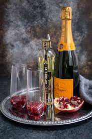 St Germain And Pomegranate Champagne Cocktail Girlinthelittleredkitchen Com Mojitoilustra Champagne Recipes Cocktails Champagne Cocktail Prosecco Cocktails
