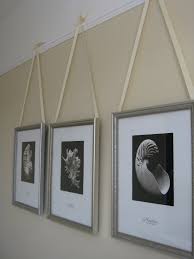 Decorative Way To Hang Pictures I Painted Our Guest Room Walls Toasted Marshmellow From Osh Ceilin Hanging Pictures Picture Rail Molding Picture Molding