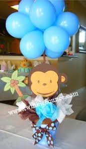 These games don't have real winners but they are great at helping attendees get to know each other! Pin By Mariana Reyna On Party Planning Monkey Baby Shower Baby Shower Monkey Theme Baby Shower Centerpieces