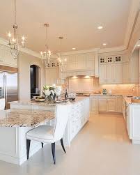 All cabinets in this kitchen are consistent, but a variety of countertops adds drama and distinguishes. 30 Simple And Elegant Kitchen Design Inspiration Elegant Kitchen Design Elegant Kitchens Kitchen Design