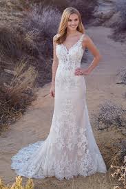 Luxury fur accessories for winter wedding. Ivory Off White Wedding Dresses Enchanting By Mon Cheri