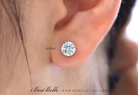 For example, a 6.5 mm round diamond, sapphire, and opal, all cut in the same proportions, will all weigh different. 4 Prongs Solitaire Stud Earrings Minimal 2mm To Bigger 10mm Etsy Diamond Shape Earrings Stud Earrings Diamond Earrings Studs