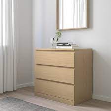 All the malm drawers or similar types of chest of drawers have the fixing devices so people can attach them to the wall to avoid tipping over. Malm Chest Of 3 Drawers White Stained Oak Veneer 80x78 Cm Ikea
