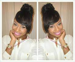 A woman's hands are repetitious in making the bun hairstyle. Easy Side Bangs Bun No Glue No Sew Tutorial Youtube
