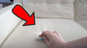 Most sofas will be finished leather and it's fine to use a slightly damp cloth with a small amount of a gentle soap to give it a quick clean. White Leather Sofa Cleaning With 6 Kids Youtube