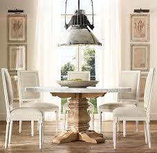 Rh S Salvaged Wood Marble Trestle Round Dining Table Our Table From Designer Timothy Oulton Pairs A 2 34 Thick Round Dining Table Round Dining Dining Table
