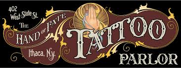 Tattoo specialist create tattoo in tattoo parlour. The Hand Of Fate Tattoo Parlor Ithaca New York Usa Your Local Tattoo Shop