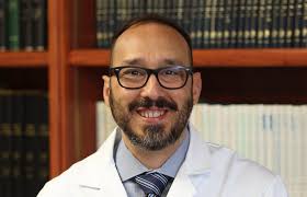 David J. De la Garza, M.D.