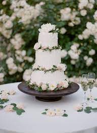 The Garden Wedding Decor Every Romantic Outdoor Bash Needs Garden Wedding Cake Tiered Wedding Cake Wedding Cake Table