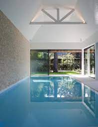 luxe buitenverblijf met zwembad en terras hoog exclusieve woon en tuin inspiratie moderne inrichting tuin inspiratie architectuur huis