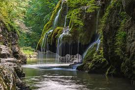 Hidden in the anina mountains, bigar waterfall is truly spectacular. Bigar Waterfall In Romania Seen On A Sunny Day Photograph By George Afostovremea