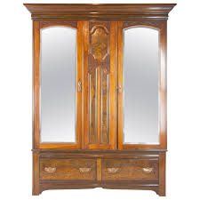 The two door armoire cabinet opens up into a large three shelf space which is finished in warm variations in solid wood grain patterns are to be expected and make each furniture uniquely at houzz we want you to shop for sierra living concepts estero solid mango wood floral hand. Antique Walnut Armoire Three Door Armoire Vintage Wardrobe Scotland 1895 At 1stdibs