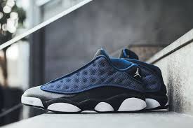 Retro 13 Black And Blue Air Jordan 13 Retro Low Brave Blue Black Dropping This Week Air Jordans Sneakers Sneaker Magazine