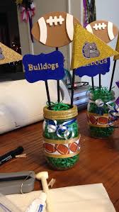 Shop plain and themed party decorations for any occasion including banners, bunting, paper create your perfect party with our huge range of party decorations! Personalized Football Centerpieces Football Centerpieces Football Party Decorations Centerpieces Football Theme Party