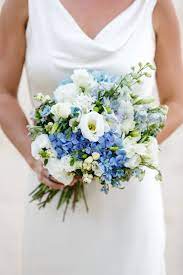 Blooms by the box is open and fully staffed to assist with your diy flower questions and wedding planning. Country Style Bouquet Consiting Of Blue Delphinium And Blue Wedding Bouquet Blue Wedding Flowers Wedding Flowers Summer