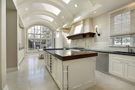 Defining the kitchen, dining, and sitting room space by varying ceiling. 52 Beautiful Kitchens With Skylights Pictures