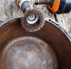 A Wire Brush On A Cordless Drill Will Remove Even The Heaviest Rust From A Pan Cleaning Cast Iron Skillet Cleaning Rusty Cast Iron Cleaning Cast Iron Pans