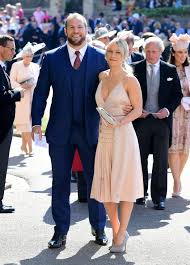 At the royal wedding, she looked every bit the stylish brit in a navy blue dress, bright red heels, and fascinator hat. Braless Chloe Madeley And Victoria Beckham Lead The Worst Dressed At The Royal Wedding Missing The Mark Le Mirror Online