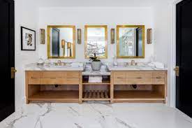 Rather than hiding all of your towels and other accessories behind cabinetry, more bathrooms are starting to make use of open shelving and open vanities that show off these things in style. How To Know If An Open Bathroom Vanity Is For You