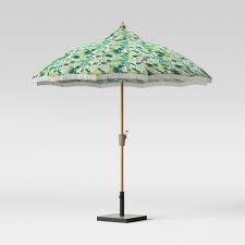 Get 5% in rewards with club o! 9 Carousel Shape Patio Umbrella Duraseason Fabric Opal Tropical With Fringe White Light Wood Pole Opalhouse Target