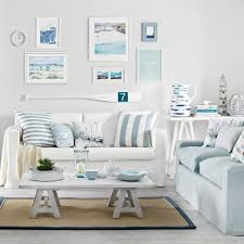 Line the walkways with strips of fabric on bamboo poles or wood stakes. Casual Coastal Living Room Decor Ideas With A Beach Vibe From House To Home Coastal Decor Ideas Interior Design Diy Shopping