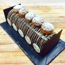 Antonio Bachour On Instagram Buche De Noel Manjari Mousse Milk Chocolate Namelaka Hazelnut Crunch Mango Crem Chocolate Milk Buche De Noel Chocolate Book