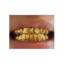 Pin By Cynthialynn Ward On Drippin With Dopeness Gold Grill Gold Teeth Gold Hands