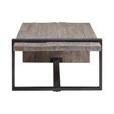 This wood coffee table comes in a thoroughly weathered finish with dark metal corner brackets and x sides. Genero Coffee Table Uttermost