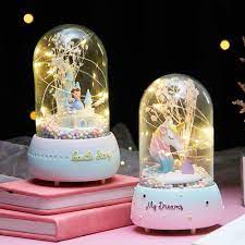 Rotating crystal ball music box creates a unique light pattern on the ceiling as it plays a lovely melody inset light illuminates crystal ball for 8 to 12 hours choose a moon, star or bubbling sea crystal ball design on a maple wood base includes charger see the top 3 reasons… Crystal Ball Music Box Rydli Decor