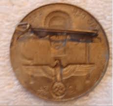 Hello gentlemen, would the correct german title of this tinnie be tag der arbeit 1934 or 1934 tag der arbeit please? Ww2 German Soviet Allied Militaria Uniforms Awards Weapons History War Relics Forum