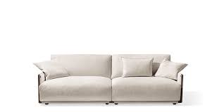 Aton is a series of modular sofas with the structure of the base feet in solid american walnut. Sofas Giorgetti