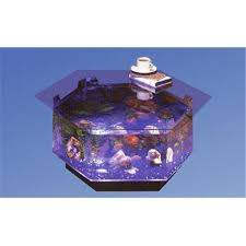 Made from acrylic and glass, this long and narrow table aquarium resembles the profile of a ship and comes complete with a filter and lights. Midwest Tropical O 100 Aqua Octagon Coffee Table Aquarium Walmart Com Walmart Com