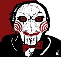 A su lado, hay otra persona encadenada, el dr. 52 Ideas De Billy Saw Juego Macabro Peliculas De Terror Personajes De Terror