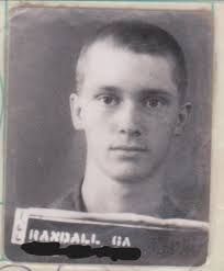 It's July of 1976 and I left home after high school graduation, and two  months after turning 18, and joined the Navy to experience the world. My  boot camp photo looks like