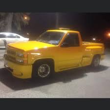 Image result for Bright Yellow 1990 Truck