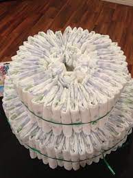 Folded Diaper Cakes Are Way Easier Baby Diaper Cake Baby Girl Diaper Cake Baby Shower Crafts