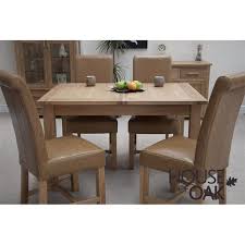 The darker surface and contrasting metal legs sure to turn a few heads. Opus Oak Extending Dining Table House Of Oak