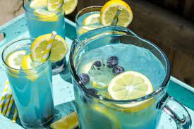Don T Settle For Pink Lemonade Try Something Blue This Summer Blue Lemonade With Blueberries And Blackber Blue Lemonade Recipe Baby Shower Drinks Blue Juice